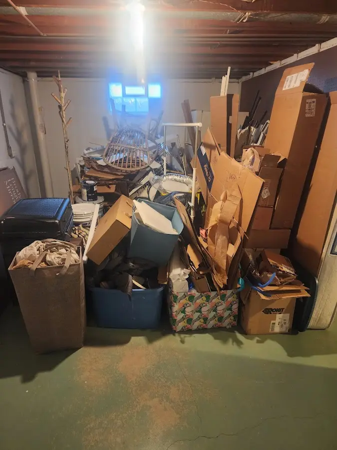 Roll-off dumpster container at job site for 2 Yard Dumpster Rental in Paradise